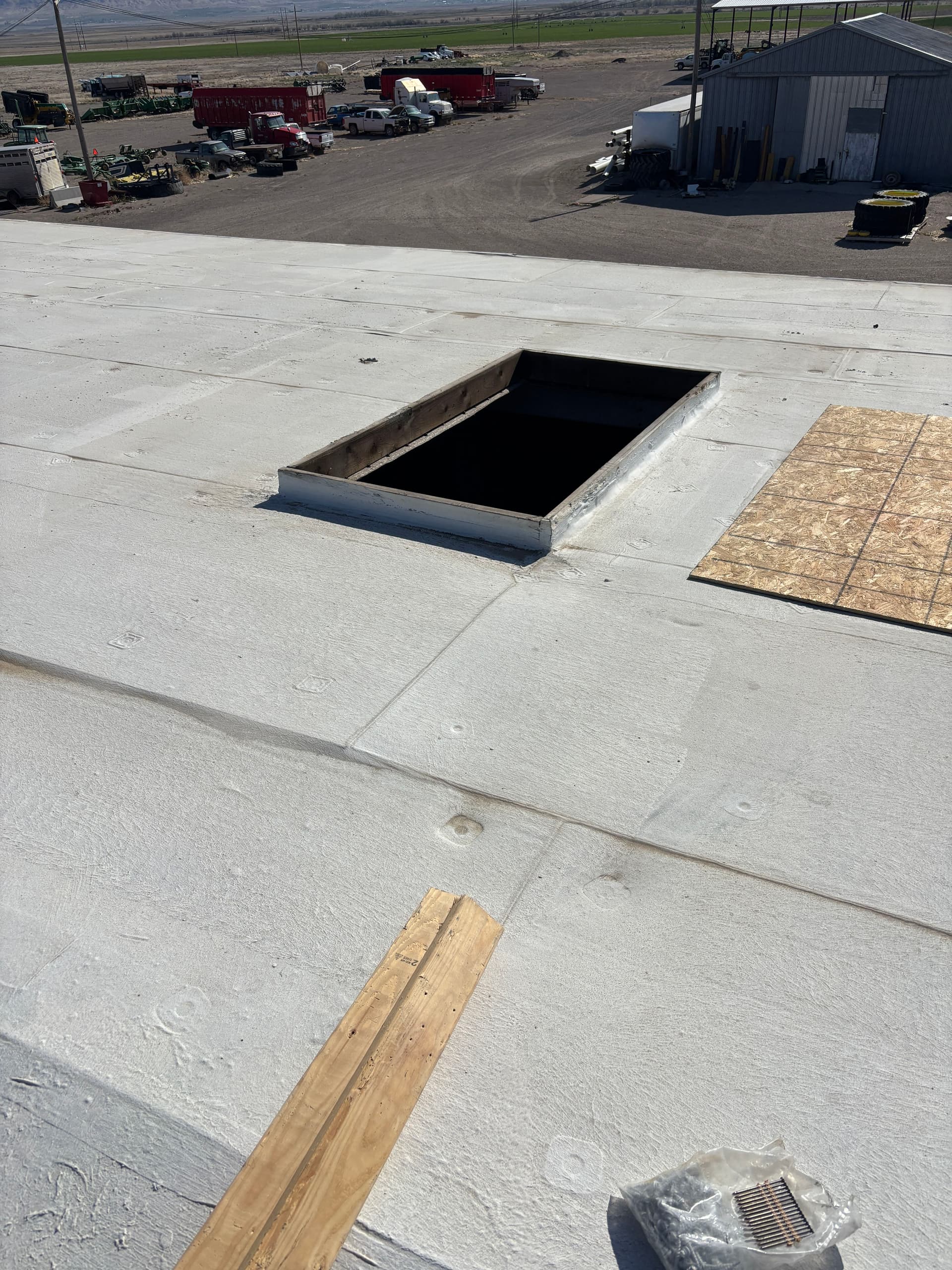 Gallery photos for Farm Building flat roof repair in ELberta Utah: Image #1